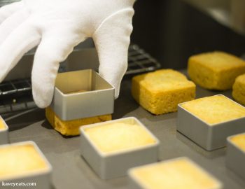 Removing Taiwanese pineapple cakes from the metal moulds