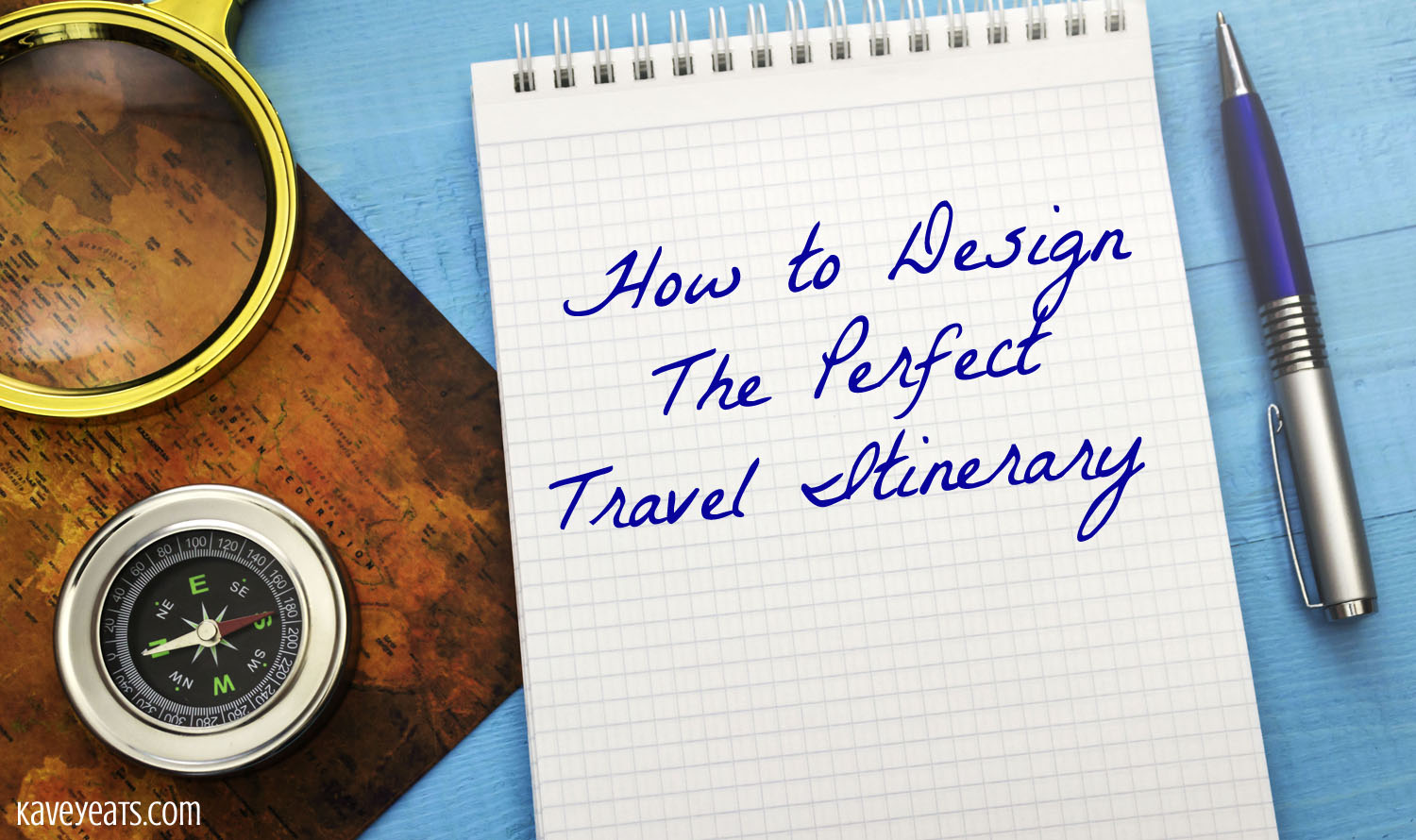 Hand writing onto a note pad the text "how to design the perfect travel itinerary"