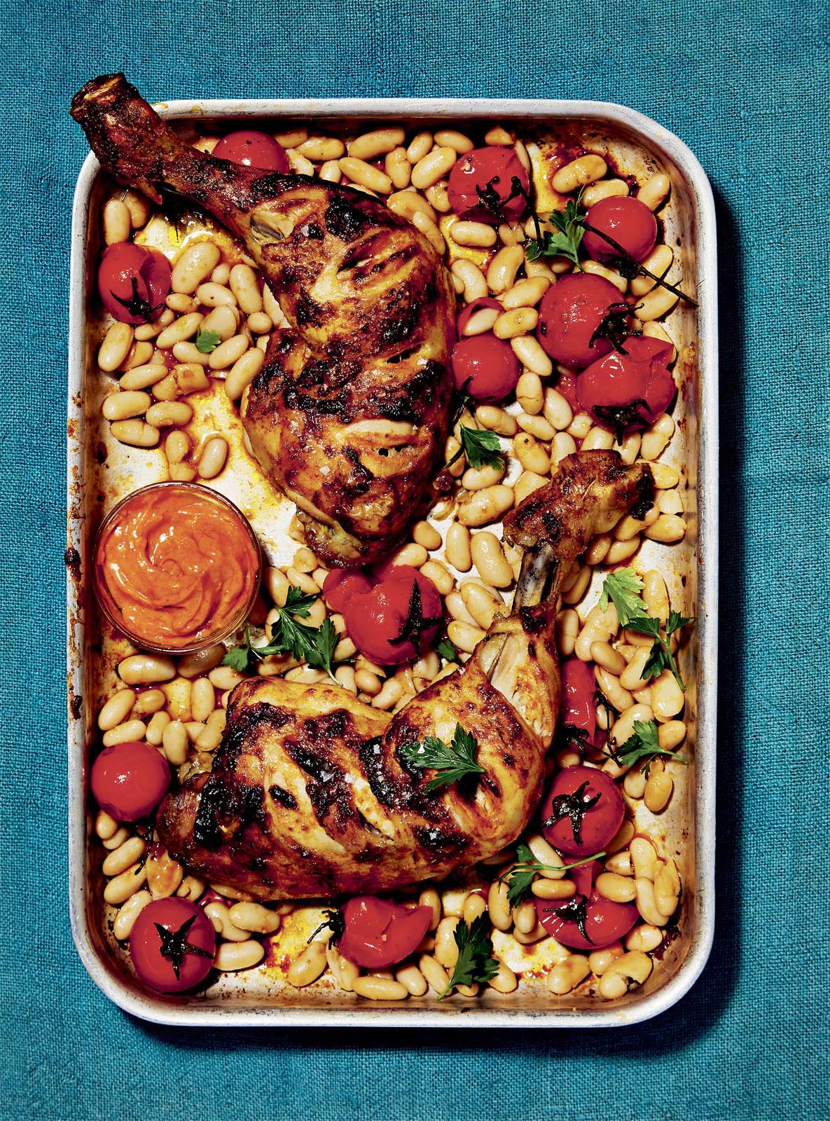 Smoky paprika chicken with warm cannellini beans