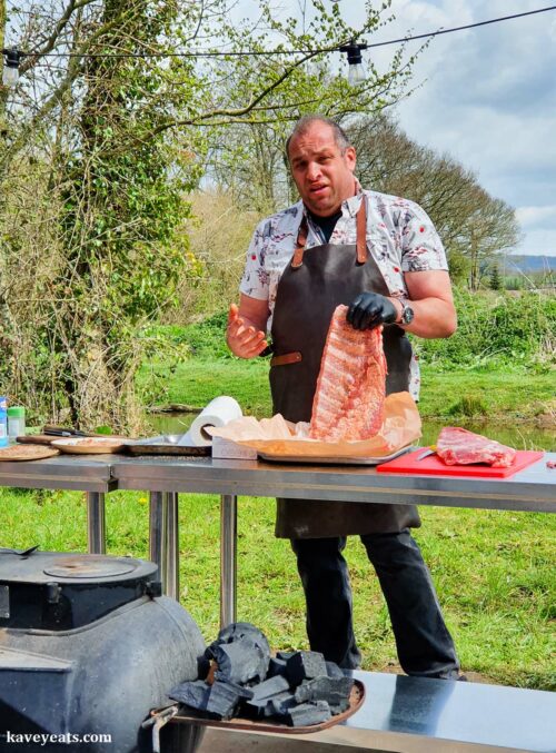 Showing us how to handle the pork ribs - Marcus Bawdon's Country Wood Smoke UK BBQ School (Kavey Eats)